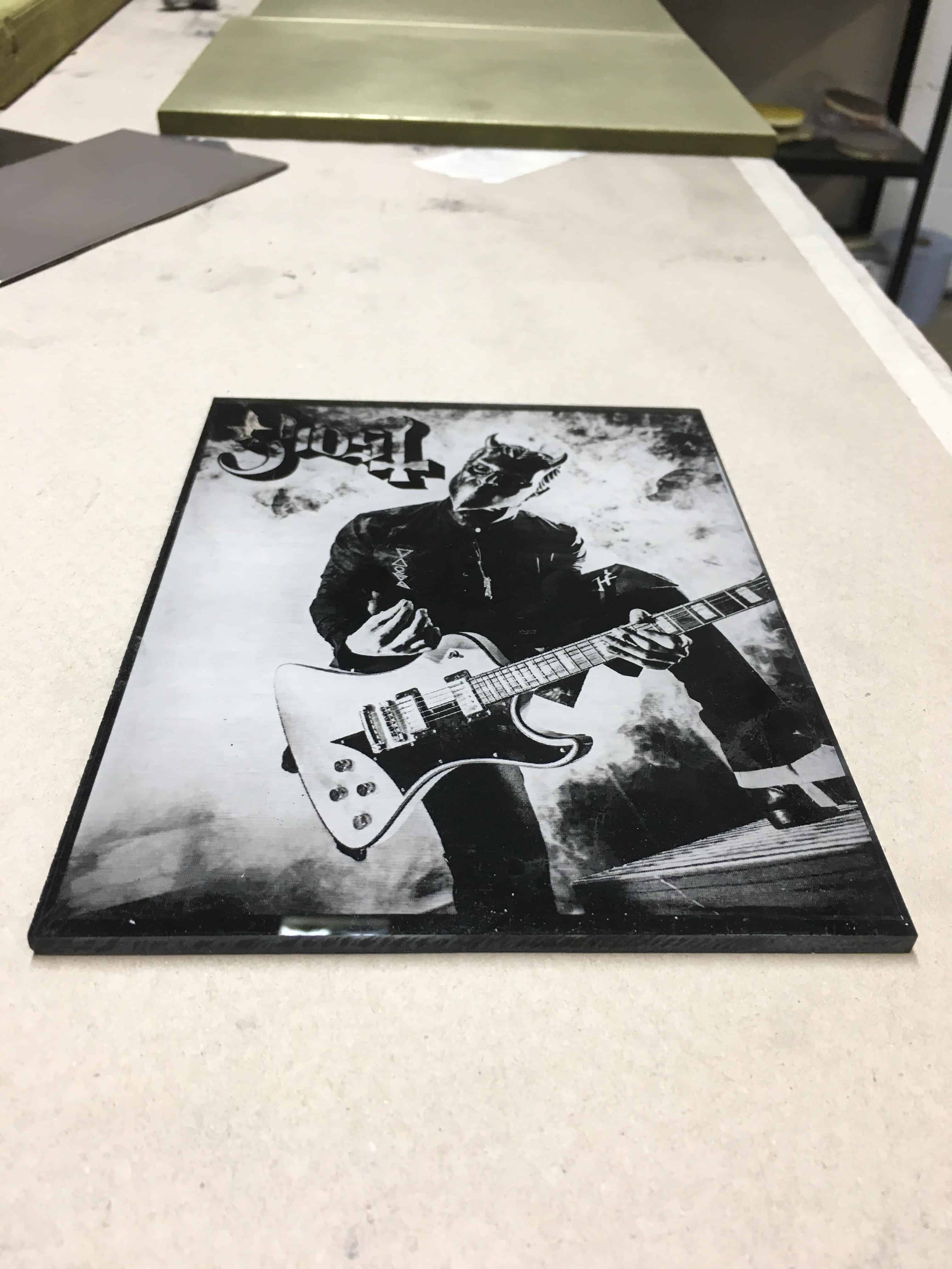 White Sprayed Black Acrylic, Laser Engraved to reveal the picture